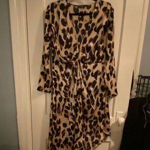 Deep v-neck leopard print dress, asymmetrical cut